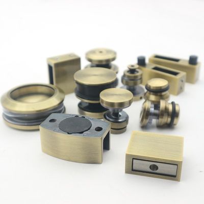 Sistema di porte scorrevoli SS304 senza cornice con rulli in oro polacco e stile di progettazione senza cornice